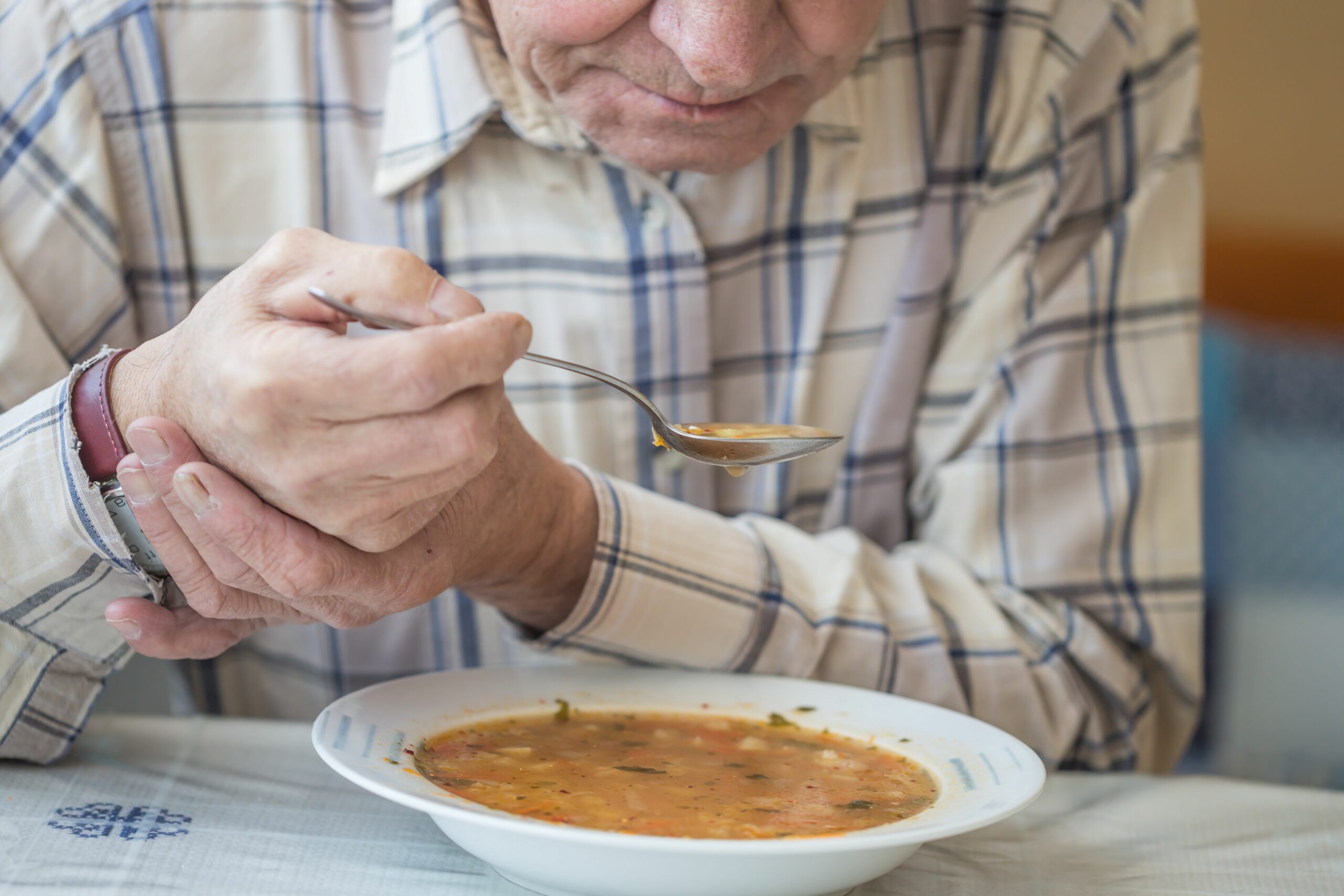 Rosemont Pharmaceuticals - How Does Dysphagia Affect Eating? - Elderly man eating soup