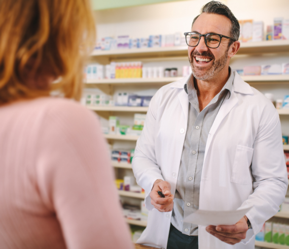 Pharmacist with customer