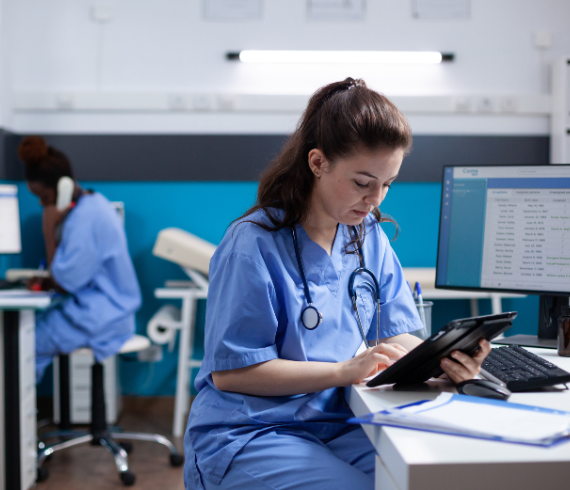 Rosemont Pharmaceuticals - Female doctor accessing information on her tablet