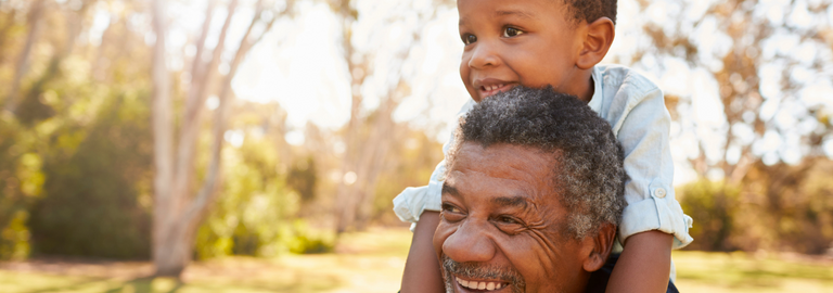 Rosemont Pharmaceuticals - Elderly man smiling with child on his shoulders