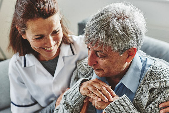 Nurse with older adult